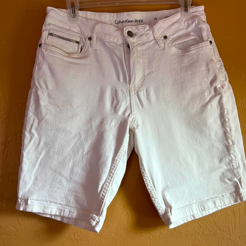 Calvin Klein white Bermuda shorts.